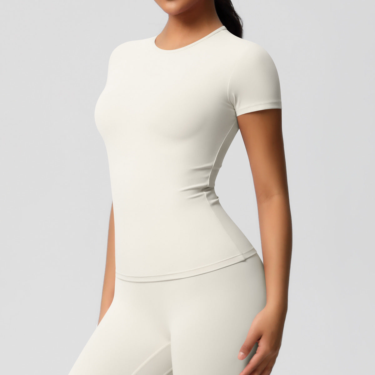 Completo Sportivo Donna – Top Schiena Lavorata e Pantaloni – Maglia manica corta 7103 – avorio