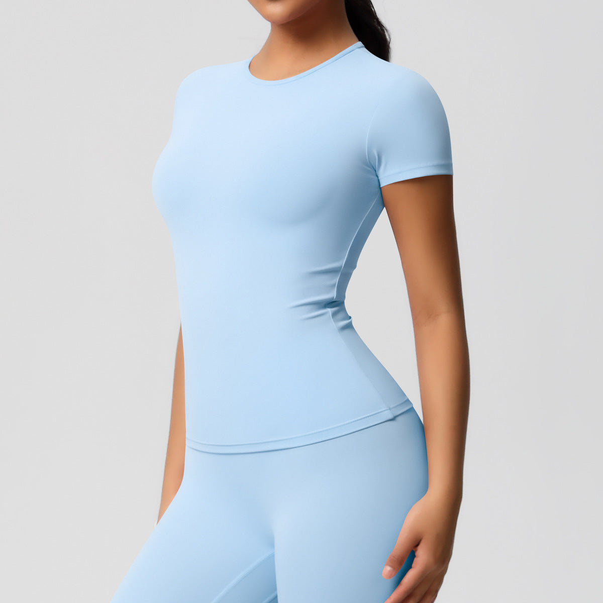 Completo Sportivo Donna – Top Schiena Lavorata e Pantaloni – Maglia manica corta 7103 – azzurro cielo