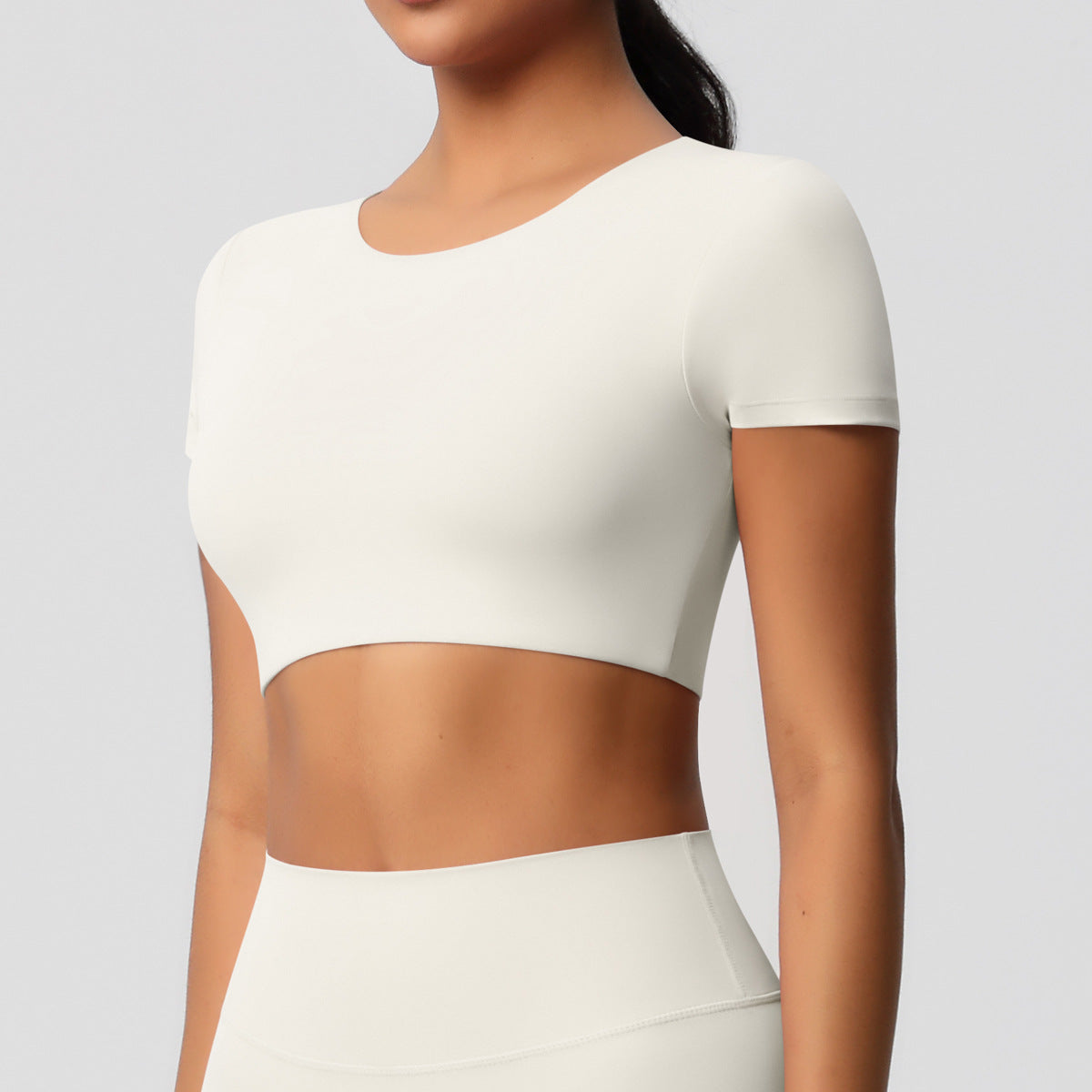 Completo Sportivo Donna – Top Schiena Lavorata e Pantaloni – Maglia manica corta 7105 – avorio